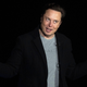 Elon Musk gestures as he speaks during a press conference at SpaceX's Starbase facility near Boca Chica Village in South Texas on February 10, 2022. - Billionaire entrepreneur Elon Musk delivered an eagerly-awaited update on SpaceX's Starship, a prototype rocket the company is developing for crewed interplanetary exploration.